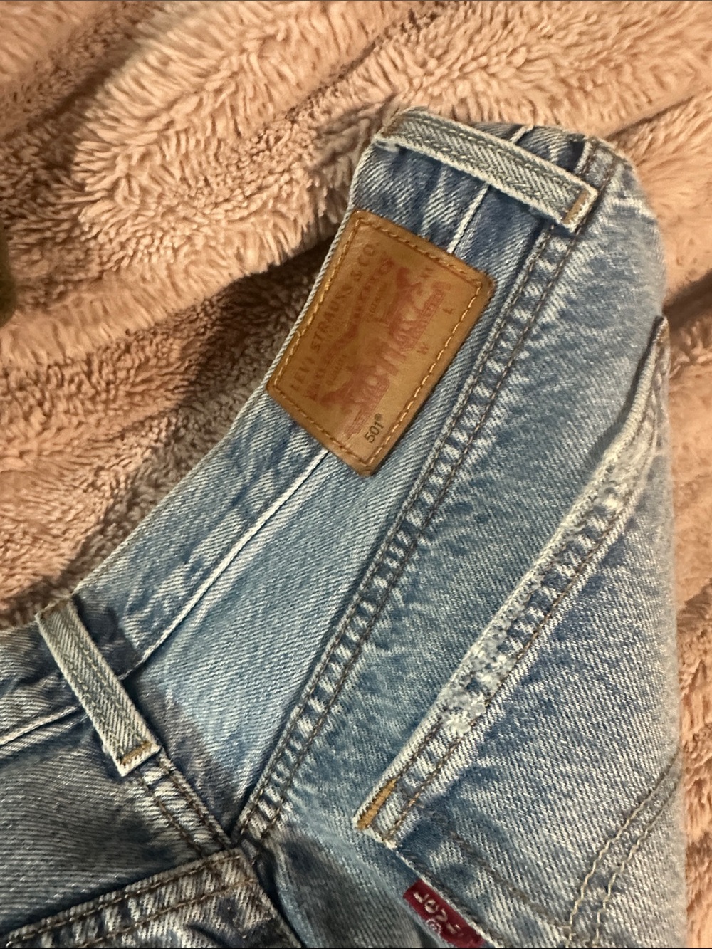 Levi's Light Blue Denim Jeans with Tan Leather Patch